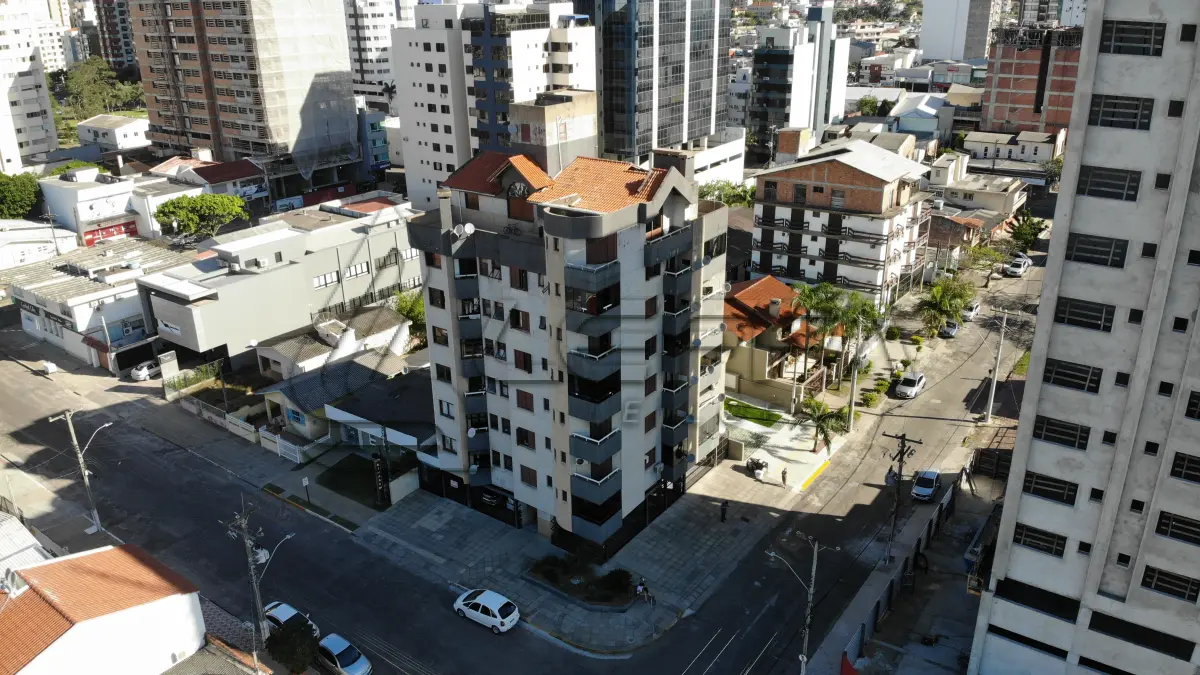 LOTE 002 - Apartamento 201 e Box 06, do Edifício Residencial Porto Seguro no Centro de Torres/RS
