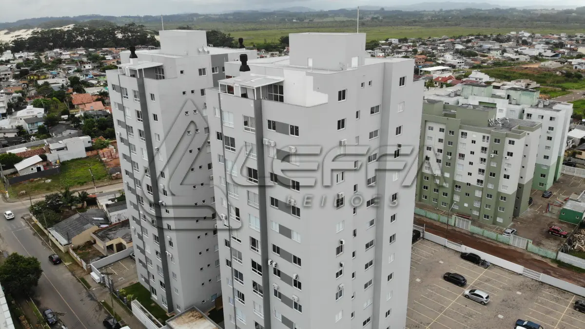 LOTE 001 - Apartamento nº 1203 e box de garagem nº 111, do Edifício Residencial Due Fratelli, em Torres/RS
