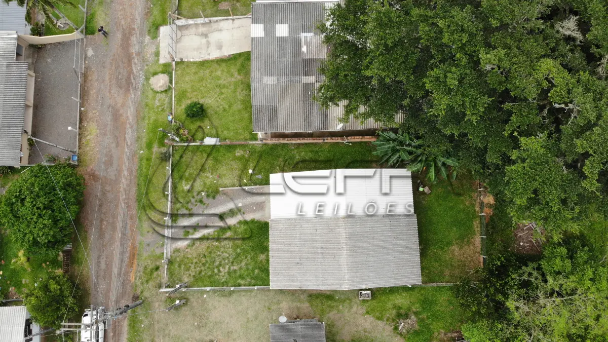 LOTE 001 - Terreno Urbano, com benfeitorias, na Rua Mario Dalpiaz, nº 130, na Vila São João, em Torres/RS