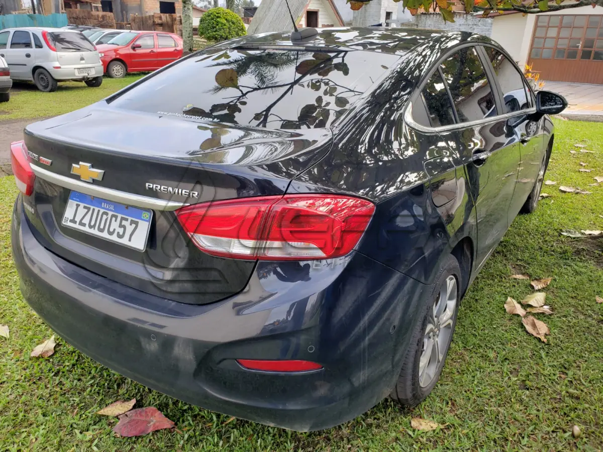 LOTE 001 - UM VEÍCULO GM CRUZE PRE2 NB AT, PLACAS IZU-0C57, ANO/MODELO 2020, COR PRETA, RENAVAM Nº 1217025941