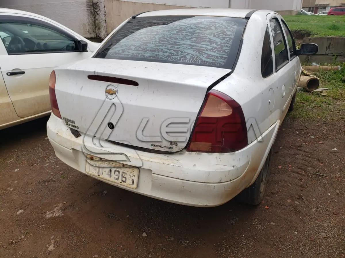 LOTE 001 - UM VEÍCULO GM/CORSA SEDAN PREMIUM, FLEX, PLACAS ISD-4965, ANO 2011, MODELO 2012