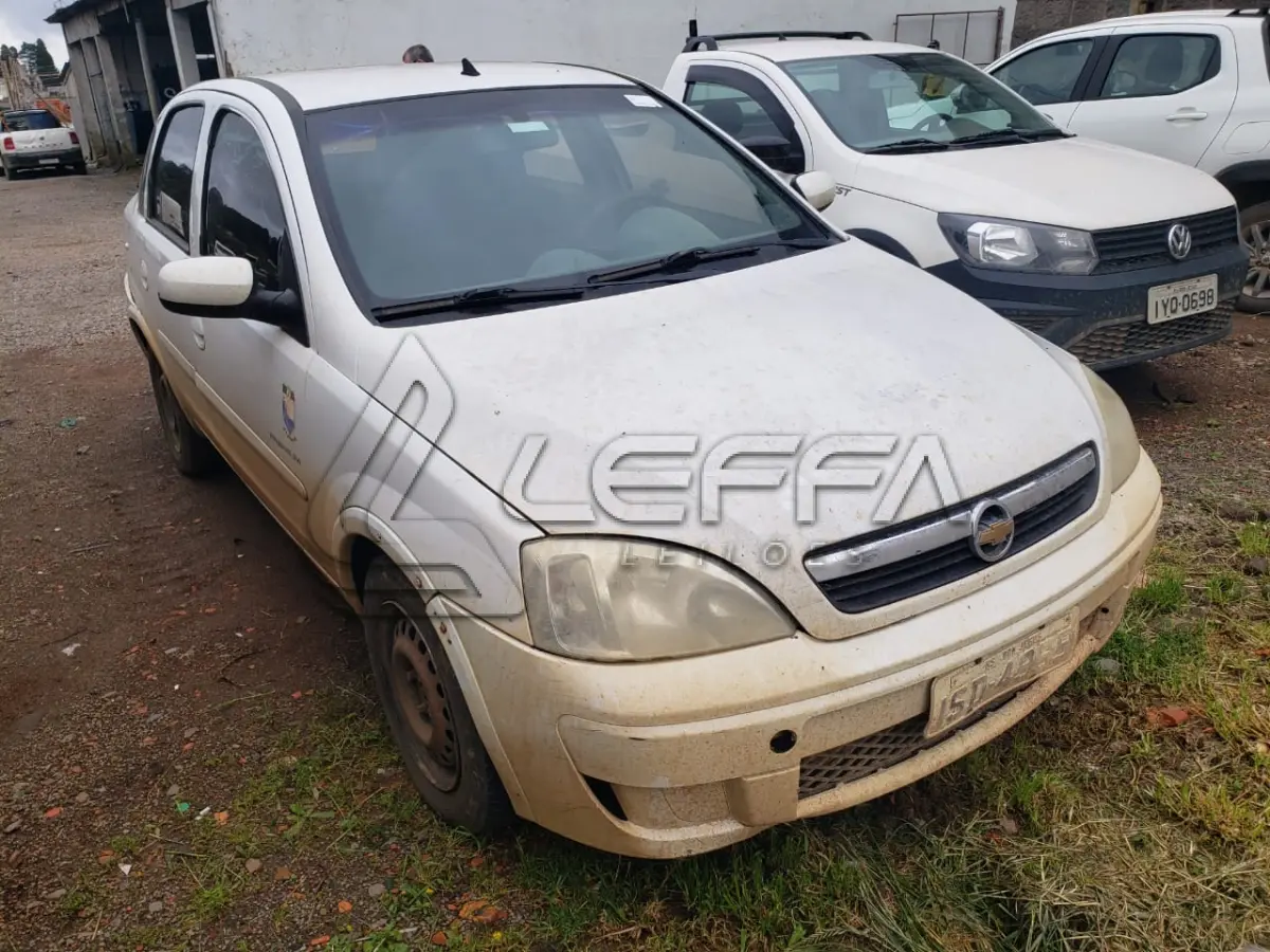 LOTE 001 - UM VEÍCULO GM/CORSA SEDAN PREMIUM, FLEX, PLACAS ISD-4965, ANO 2011, MODELO 2012