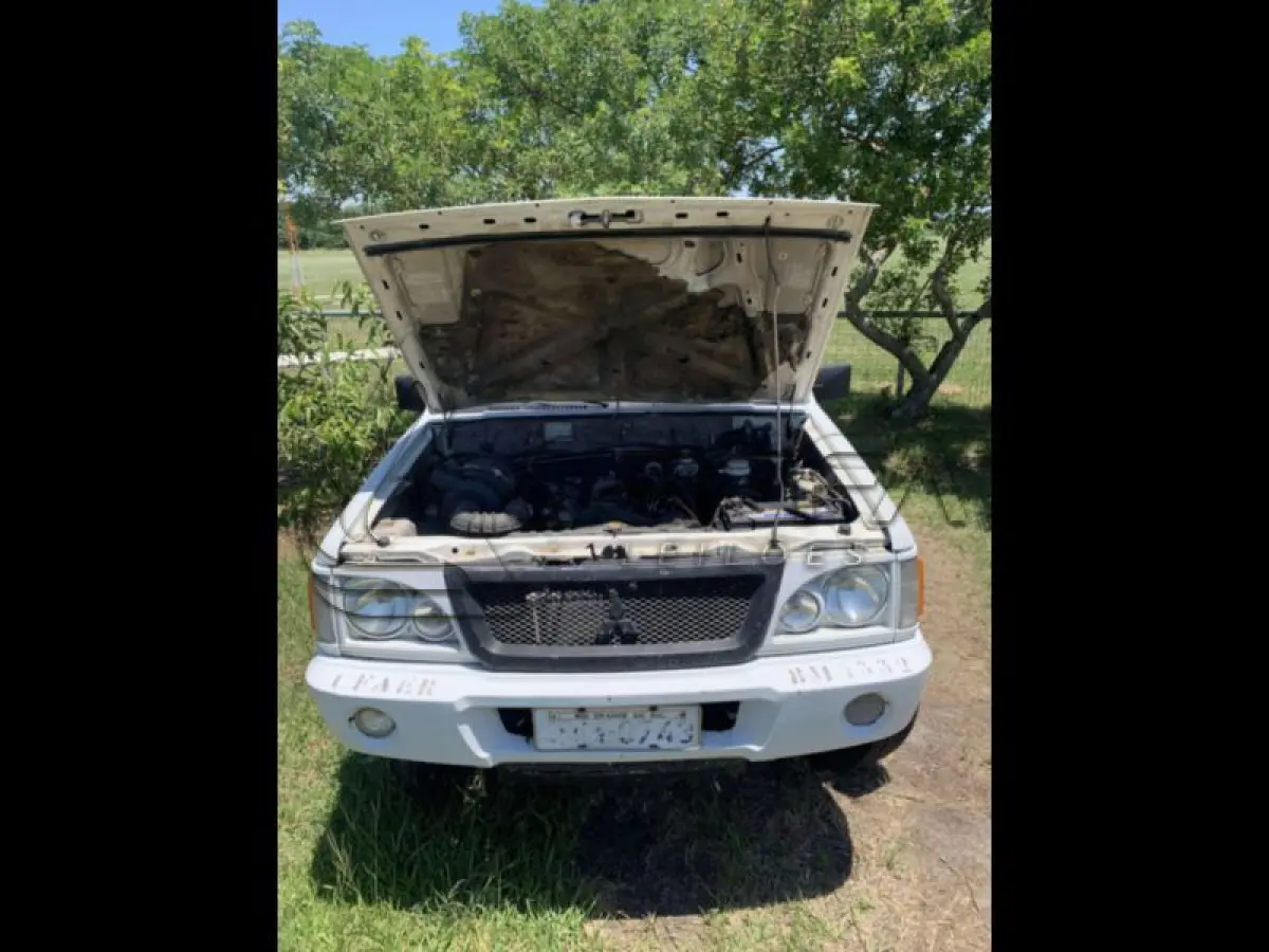 LOTE 007 - MMC/L200 4X4 L