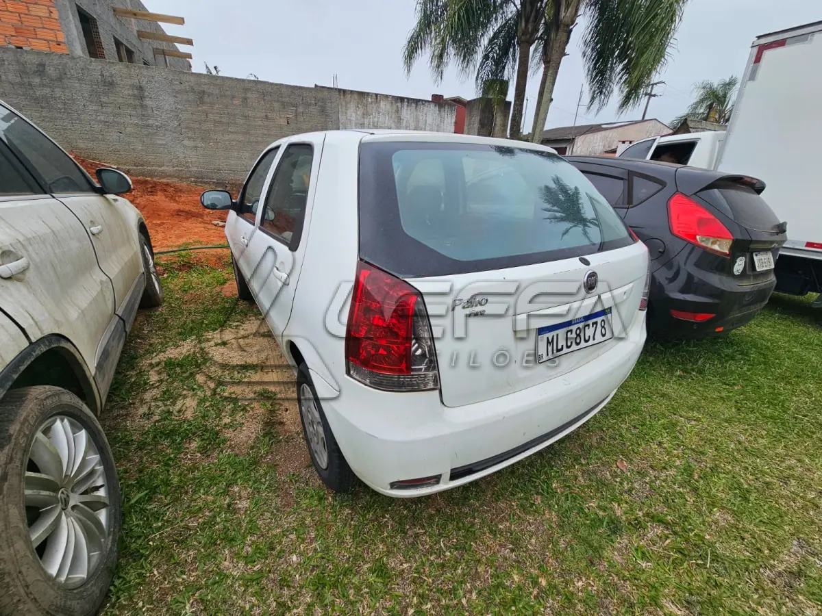 LOTE 003 - Um veículo automóvel nacional marca FIAT/PALIO FIRE ECONOMY,  cor branca, a álcool/gasolina, ano de fabricação e modelo 2012/2013, placa  MLC8C78