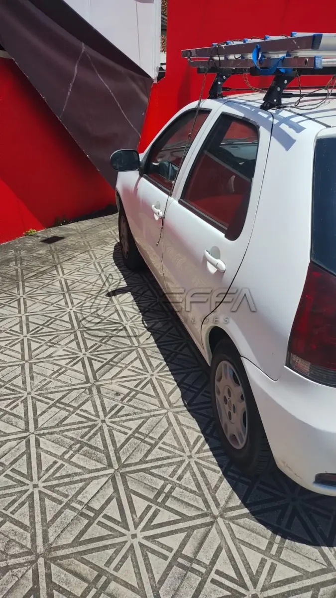 LOTE 003 - Um veículo automóvel nacional marca FIAT/PALIO FIRE ECONOMY,  cor branca, a álcool/gasolina, ano de fabricação e modelo 2012/2013, placa  MLC8C78