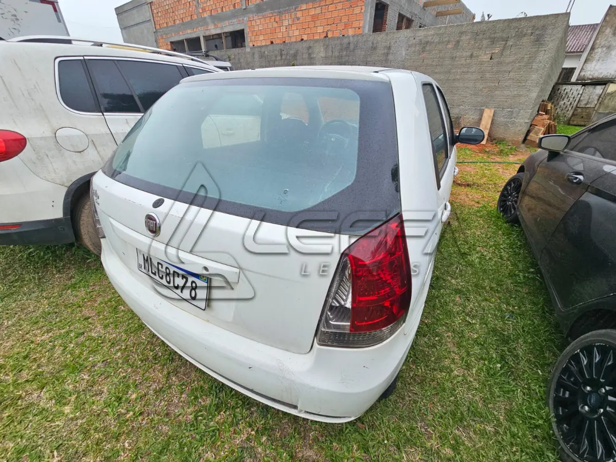 LOTE 003 - Um veículo automóvel nacional marca FIAT/PALIO FIRE ECONOMY,  cor branca, a álcool/gasolina, ano de fabricação e modelo 2012/2013, placa  MLC8C78