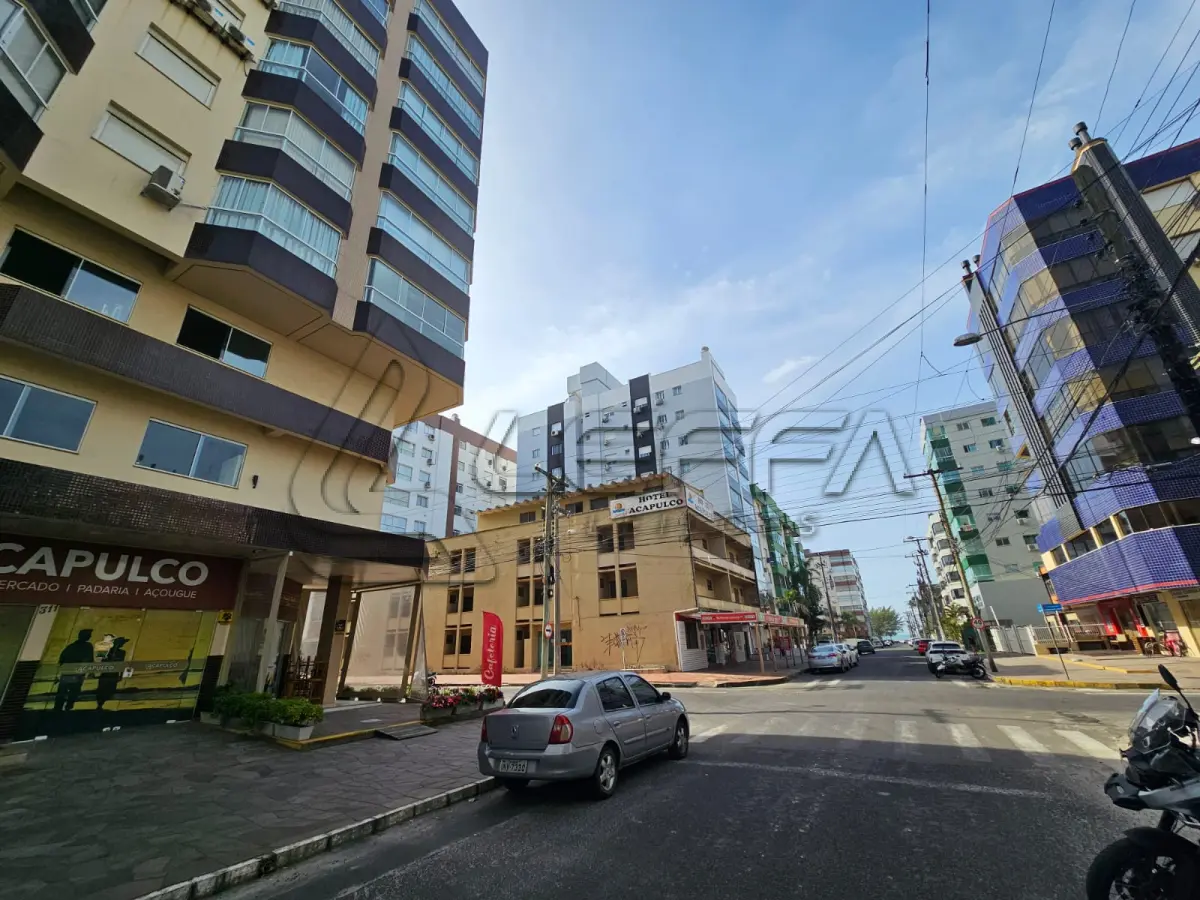 LOTE 001 - UM APARTAMENTO N° 504 (QUINHENTOS E QUATRO), do Edifício Comercial e Residencial TUIANE, situado na Rua 4 (quatro), n° 1143, na Praia ZONA NOVA DE CAPÃO DA CANOA, neste Município de CAPÃO DA CANOA/RS