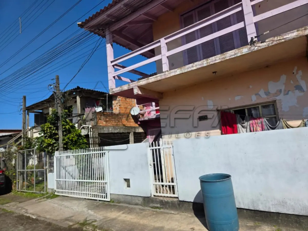 LOTE 001 - DIREITOS POSSESSÓRIOS DO IMÓVEL ASSIM DESCRITO: UM TERRENO  URBANO, localizado na Rua Feliz, nº 1750, Bairro Curtume, cidade de Torres/RS