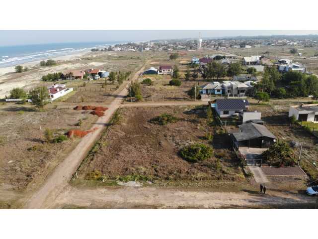 Terreno Urbano na Praia Real, constituído pelos lotes 09/10/11/14/15/16 da quadra 33, em Torres/RS