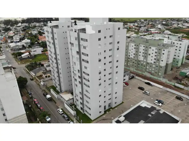 Apartamento nº 1203 e box de garagem nº 111, do Edifício Residencial Due Fratelli, em Torres/RS