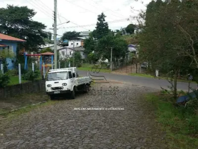 LOTE 003 - CASA NA RUA GENERAL CÂMARA EM PAROBÉ/RS