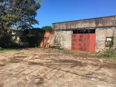 LOTE 001 - TERRENO URBANO COM BENFEITORIAS NA VILA SÃO JOÃO EM TORRES/RS