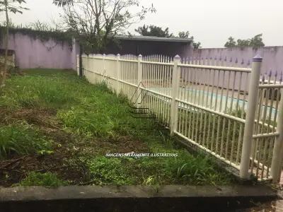 LOTE 003 - CASA NA RUA GENERAL CÂMARA EM PAROBÉ/RS