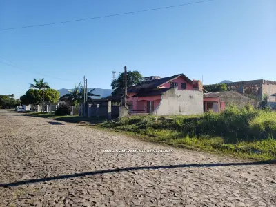 LOTE 001 - Casa de Alvenaria de dois Pavimentos, na rua Lourenço Mello, em Terra de Areia/RS