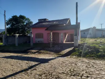 LOTE 001 - Casa de Alvenaria de dois Pavimentos, na rua Lourenço Mello, em Terra de Areia/RS