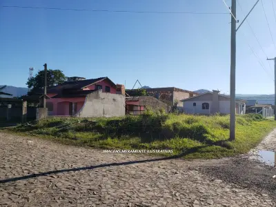 LOTE 001 - Casa de Alvenaria de dois Pavimentos, na rua Lourenço Mello, em Terra de Areia/RS