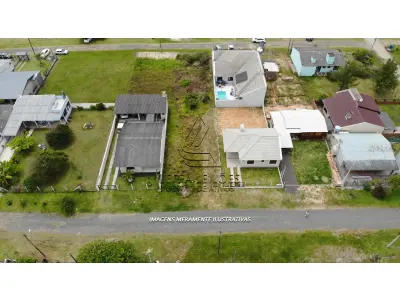 LOTE 003 - Um Terreno Urbano, Lote 14 Quadra 08, no Balneário Perola, em Arroio do Sal RS