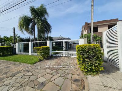 LOTE 001 - DIREITOS POSSESSÓRIOS – UMA CASA RESIDENCIAL, LOCALIZADA NA RUA OLMIRO LIMA, Nº 455, BAIRRO GUARÁ, MUNICÍPIO DE XANGRI-LÁ/RS.