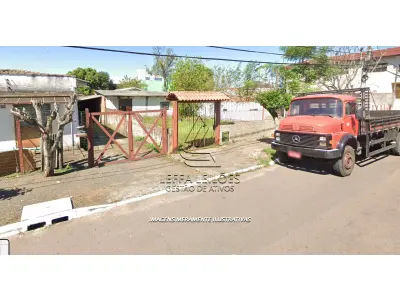LOTE 001 - UM TERRENO URBANO DE APROXIMADAMENTE 500m², COM BENFEITORIAS, SITUADO NO BAIRRO VILA MATHIAS VELHO, CANOAS/RS