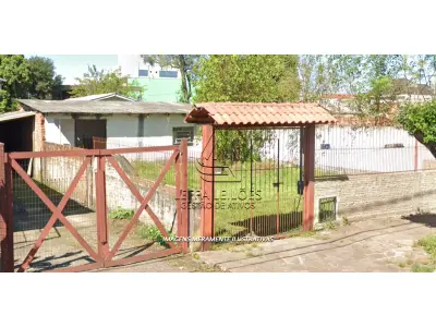 LOTE 001 - UM TERRENO URBANO DE APROXIMADAMENTE 500m², COM BENFEITORIAS, SITUADO NO BAIRRO VILA MATHIAS VELHO, CANOAS/RS