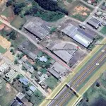 UM TERRENO COM EDIFICAÇÃO, MEDINDO 1200M² (40MX30M), NA RUA JOÃO BORGES DELFINO, SANTO ANJO DA GUARDA, ÀS MARGENS DA BR-101, TRÊS CACHOEIRAS/RS.