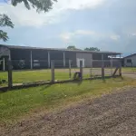 UM TERRENO COM EDIFICAÇÃO, MEDINDO 1200M² (40MX30M), NA RUA JOÃO BORGES DELFINO, SANTO ANJO DA GUARDA, ÀS MARGENS DA BR-101, TRÊS CACHOEIRAS/RS.