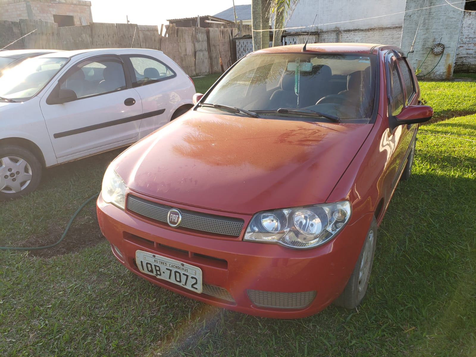 Veículo FIAT/Palio Fire Economy, 2009/2010, cor vermelha, Placas IQB-7072, RENAVAM 163662673