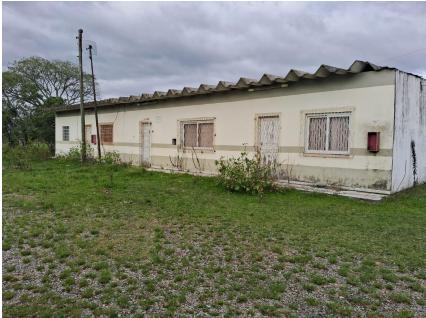 UM PRÉDIO DE ALVENARIA, COM CARACTERÍSTICAS INDUSTRIAIS, COM APROXIMADAMENTE 1.150M² DE ÁREA, E UM PRÉDIO DE ALVENARIA DE ESCRITÓRIOS, COM APROXIMADAMENTE 150M² DE ÁREA, LOCALIZADO NA CIDADE DE PELOTAS/RS