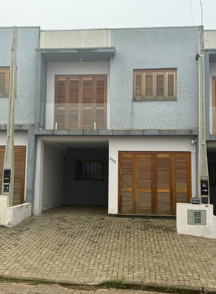 Casa em condomínio, com dois pavimentos, localizada no município de Estância Velha/RS, com área construída total de 69,83 m²